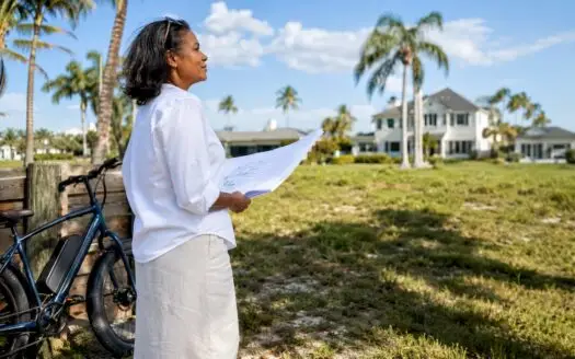 Affluent buyer inspecting Tampa vacant lot